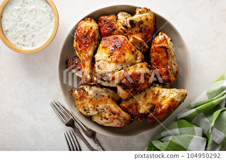 Roasted chicken with tzatziki sauce Roasted chicken with tzatziki sauce 104950292
