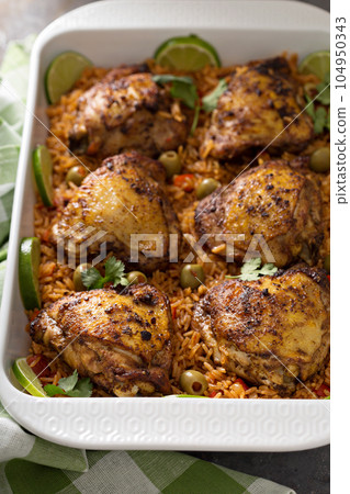 Arroz con pollo in a baking dish 104950343