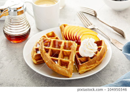 Peach waffles for breakfast 104950346