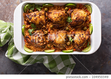 Arroz con pollo in a baking dish 104950349