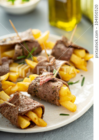 Roast beef french fries rolls 104950520