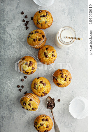 Chocolate chip muffins with milk 104950619