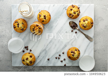 Chocolate chip muffins with milk 104950623