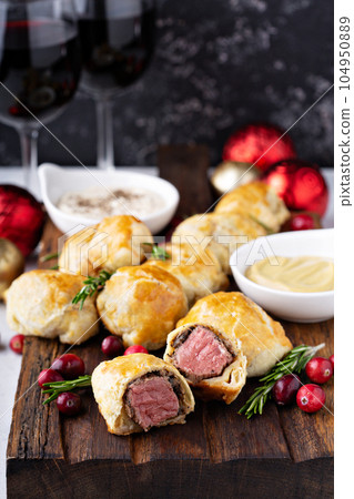 Bite size Beef Wellingtons 104950889