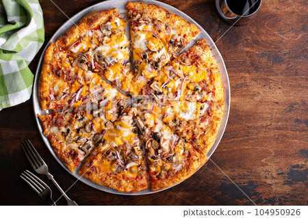 Vegetarian BBQ pizza with mushrooms and hot sauce 104950926