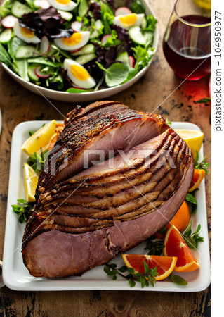 Brown sugar glazed spiral cut ham Brown sugar glazed spiral cut ham 104950977