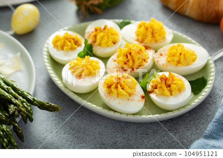 Traditional deviled eggs for Easter brunch 104951121