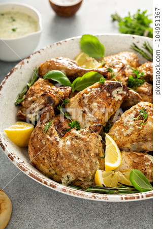 Lemon herbed garlic chicken 104951367