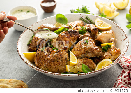 Lemon herbed garlic chicken 104951373