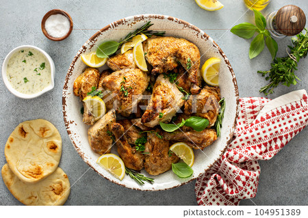 Lemon herbed garlic chicken 104951389