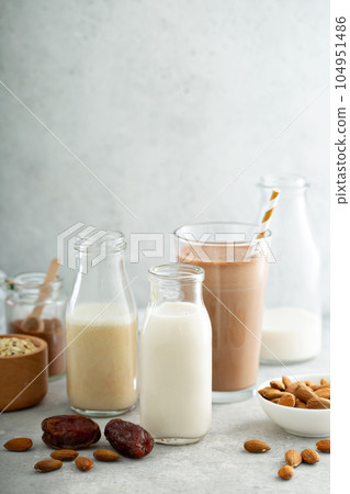 Almond and oat milk sweetened with dates and cocoa Almond and oat milk sweetened with dates and cocoa 104951486