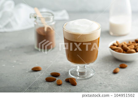 Almond milk latte in a glass Almond milk latte in a glass 104951502
