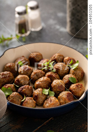 Swedish meatballs in a cast iron pan 104951505