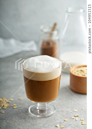 Oat milk latte with thick foam Oat milk latte with thick foam 104951515