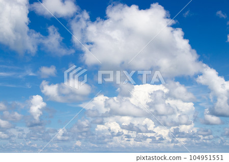 Clear blue color sky with white cloud background Clear blue color sky with white cloud background 104951551