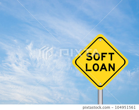 Yellow transportation sign with word soft loan on blue color sky background Yellow transportation sign with word soft loan on blue color sky background 104951561