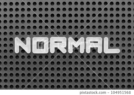 White alphabet letter in word normal on black pegboard background 104951568