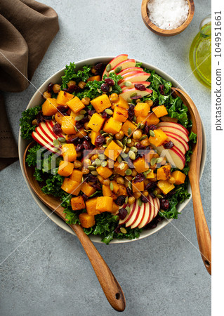 Winter or fall salad with kale and butternut squash Winter or fall salad with kale and butternut squash 104951661
