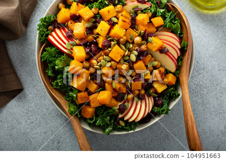 Winter or fall salad with kale and butternut squash 104951663