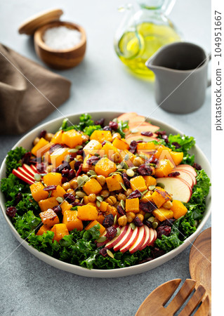 Winter or fall salad with kale and butternut squash Winter or fall salad with kale and butternut squash 104951667