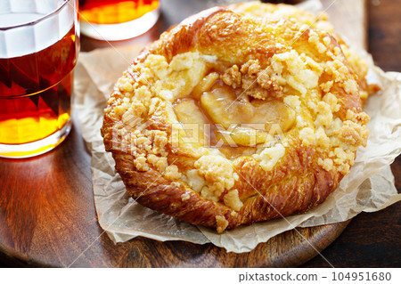 Apple danish with tea 104951680