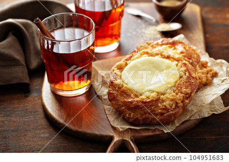 Cream cheese danishes with cinnamon tea Cream cheese danishes with cinnamon tea 104951683