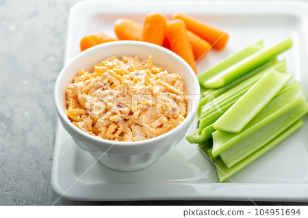 Pimento cheese with celery and carrot Pimento cheese with celery and carrot 104951694