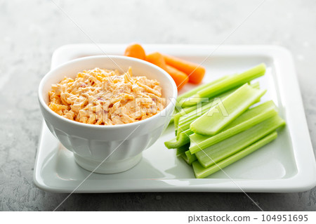 Pimento cheese with celery and carrot 104951695