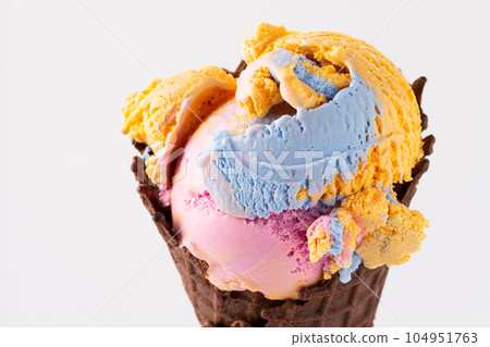 Colorful ice cream in waffle cone Colorful ice cream in waffle cone 104951763