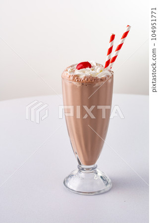 Chocolate milkshake with whipped cream 104951771