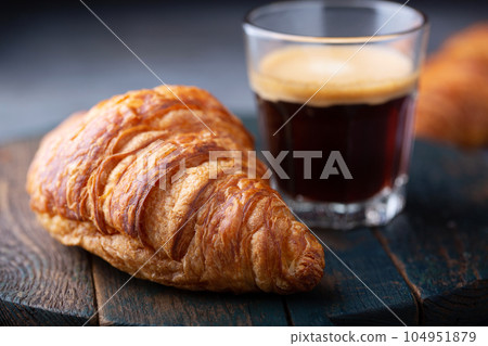 Croissant with coffee Croissant with coffee 104951879