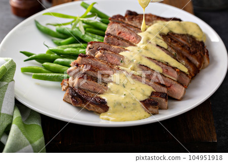 Steak with bearnaise sauce with tarragon Steak with bearnaise sauce with tarragon 104951918
