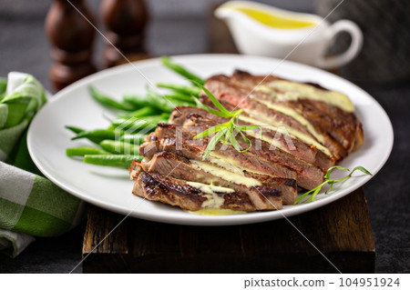 Steak with bearnaise sauce with tarragon Steak with bearnaise sauce with tarragon 104951924