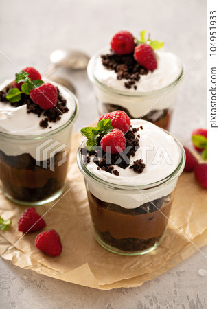 Chocolate layered dessert in a jar 104951933