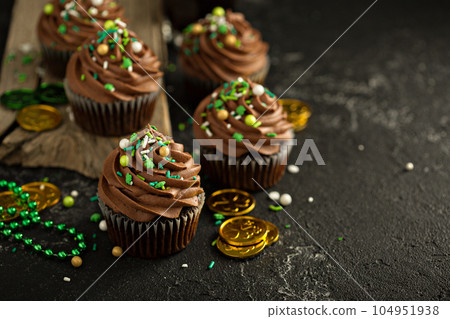 Chocolate cupcakes for Saint Patrick day 104951938