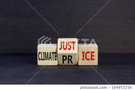 Climate justice and price symbol. Concept words Climate justice climate price on wooden cubes. Beautiful grey table grey background. Ecological climate justice and price concept. Copy space. Climate justice and price symbol. Concept words Climate justice climate price on wooden cubes. Beautiful grey table grey background. Ecological climate justice and price concept. Copy space. 104953256