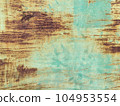 abstract background of green cracked paint on rusty 104953554