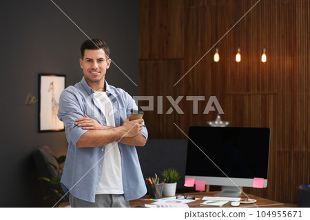 Portrait of male designer in office. Creative profession Portrait of male designer in office. Creative profession 104955671