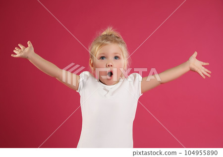 Portrait of emotional little girl on pink background 104955890