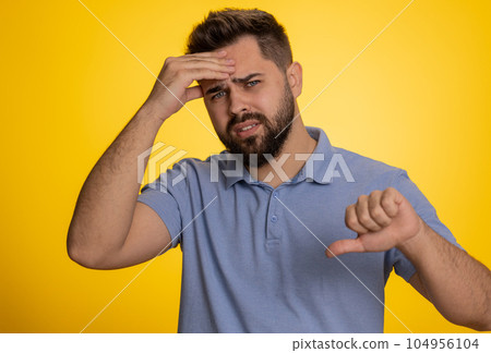 Bearded caucasian man loses becoming surprised by lottery results, bad fortune, loss, unlucky news Bearded caucasian man loses becoming surprised by lottery results, bad fortune, loss, unlucky news 104956104