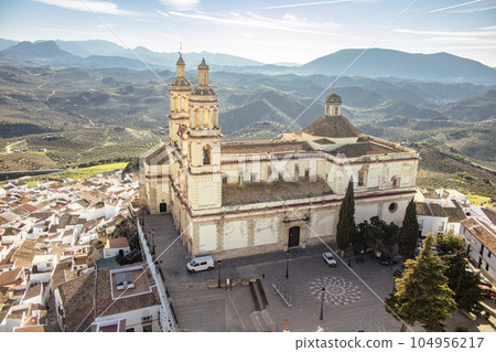 Scenic panoramic view of Church of Nuestra senora de la encarnacion in Olvera one of the white villages in Andalusia, Spain. 104956217