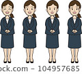 A young woman's expression pattern in a suit with her hands stacked in front 104957685
