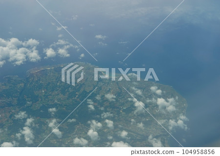 Tokunoshima taken from a passenger plane flying over (Oshima-gun, Kagoshima Prefecture, May 2022) 104958856