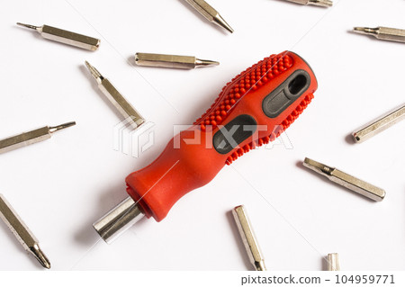 red screwdriver, white background red screwdriver, white background 104959771