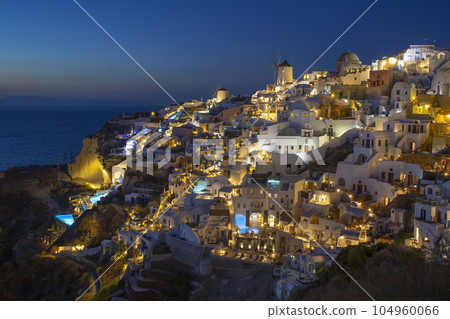 Santorini island in Greece during night. Santorini island in Greece during night. 104960066