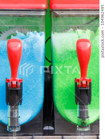 Machine for making ice cream smoothie drinks. Cold dessert Machine for making ice cream smoothie drinks. Cold dessert 104962495