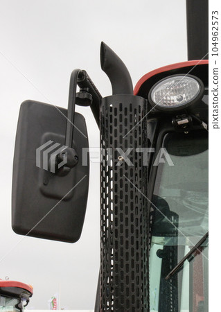 Exhaust pipe and mirror of truck or tractor. Reduction smoke in transportation Exhaust pipe and mirror of truck or tractor. Reduction smoke in transportation 104962573