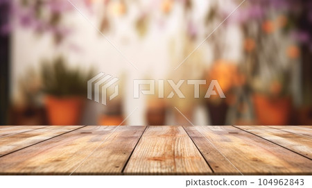 The empty wooden table top with blur background. Exuberant. The empty wooden table top with blur background. Exuberant. 104962843