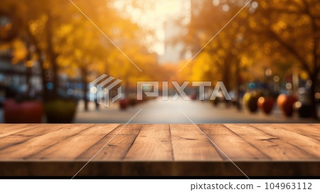 The empty wooden table top with blur background of business district and office building in autumn. Exuberant. The empty wooden table top with blur background of business district and office building in autumn. Exuberant. 104963112