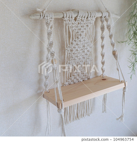 牆上的花邊掛毯架子 104963754